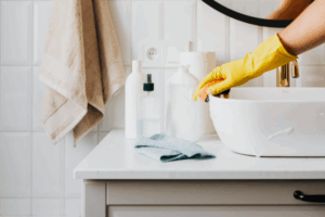 Image Credit: Pexels It feels like a never-ending battle. You clear a stubborn drain clog, only for it to return a few weeks later, slower and more frustrating than before. While it’s easy to blame the usual suspects like hair in the shower or grease in the kitchen sink, sometimes the real problem is hidden much deeper within your home's plumbing system. Understanding these less obvious culprits is the first step to finding a permanent solution. Beyond Hair and Grease We all know to avoid pouring cooking grease down the drain and to use a hair catcher in the shower. But other everyday substances can build up over time, creating persistent blockages. Soap scum, for instance, combines with minerals in hard water to form a tough, waxy residue that narrows pipes. So-called "flushable" wipes are another major offender; they don't break down like toilet paper and can easily snag and create a dam. Over time, these hidden clogged drain causes can lead to significant blockages that simple plunging can't fix. Tree Roots and Pipe Intrusions If your home has large, mature trees in the yard, their roots could be the source of your plumbing woes. Tree roots are naturally drawn to the moisture, warmth, and nutrients found in sewer lines. They can infiltrate pipes through tiny, existing cracks and joints. Once inside, they grow into dense root balls that trap waste and toilet paper, eventually causing a complete blockage. It's a slow-growing problem that you won't notice until the drains start backing up regularly. Learning how tree roots cause damage helps explain why these issues are so severe. Resolving this kind of deep-seated problem often requires professional sewer line repairs to remove intrusive roots, repair damaged pipes, and restore proper drainage. The Impact of Harsh Cleaners When faced with a slow drain, reaching for a bottle of chemical drain cleaner seems like a quick fix. However, these harsh products can do more harm than good, especially with repeated use. The corrosive chemicals are designed to dissolve organic matter, but they can also eat away at your pipes, particularly older metal or PVC plumbing. This corrosion creates rough, pitted surfaces inside the pipes that are perfect for catching hair, debris, and grease, making future clogs more likely. Instead of solving the problem, you might be creating a cycle of clogs and pipe degradation. Identifying Early Warning Signs Your plumbing system will often give you clues that a serious blockage is forming long before a full backup occurs. Paying attention to these early warnings can help you address the issue before it becomes an emergency. Keep an eye out for: Multiple slow drains in the house Gurgling sounds coming from drains or the toilet Water backing up in the shower when the washing machine drains Unpleasant, sewer-like odors coming from your drains These signs often indicate a problem in the main sewer line rather than an isolated clog in a single fixture. When DIY Isn't Enough A simple plunger or a drain snake can handle minor clogs in a single sink or tub. But if you’ve tried these methods without success, or if the symptoms you're seeing point to a larger issue, it’s time to step back. Persistently trying to force a blockage through can sometimes damage your pipes or push the clog further down the line, making it harder to remove. If you're dealing with recurring clogs, foul odors, or slow drains throughout your home, it's a clear signal that the problem is beyond a simple DIY fix and requires professional attention. Recognizing that a persistent clog might be more than just a clump of hair is key. Understanding the deeper issues that can affect your home's plumbing helps you know when to call for help and finally put an end to the cycle of slow drains.